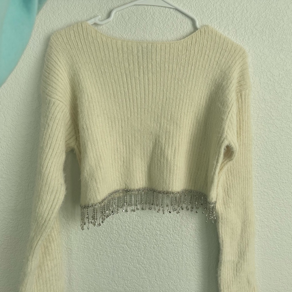 Lucy in the sky cream sweater with hanging gems